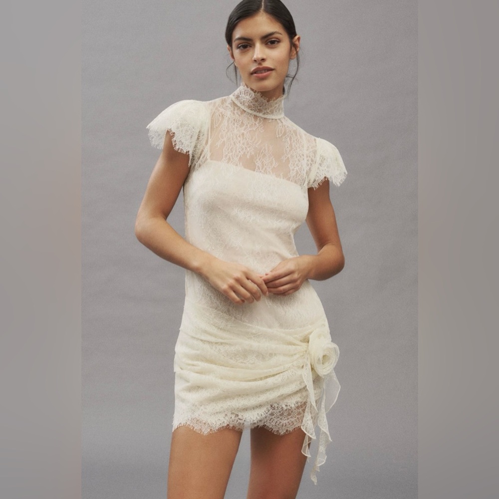 De La Vali Silentium Flounce-Sleeve Lace
Mini Dress
